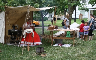 Seamstress follows the camp to provide vital service for soldiers